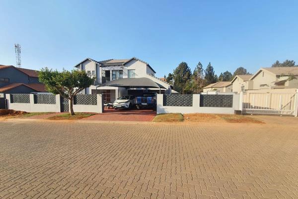 Step into sustainable luxury with this stunning 4-bedroom home, located in the serene Roodepark Eco Estate. Designed for comfort ...