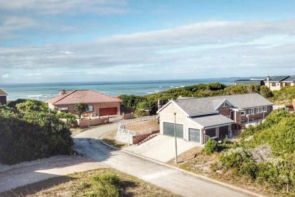 Discover your dream coastal retreat with this spacious 730 sqm stand in the heart of Paradise Beach. Just a stone&#39;s throw from the ...