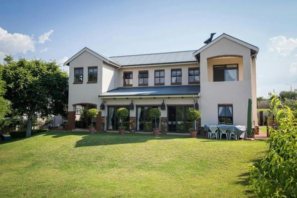 This four-bedroom home offers an exquisite blend of tranquillity and sophistication in Centurion&#39;s sought-after, farm-inspired ...