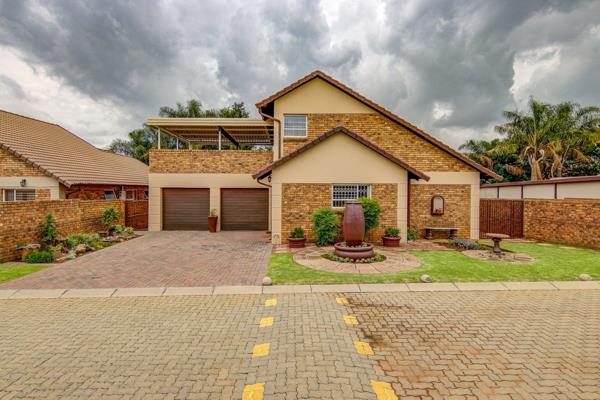 Stunning double storey cluster home in a secure, neat and well maintained complex. Tiled ...