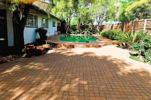 For Sale: Stunning 4-Bedroom Family Home with Pool, Lapa, and Flatl in the heart of Doringkloof, Centurion!
 
Welcome to your dream ...