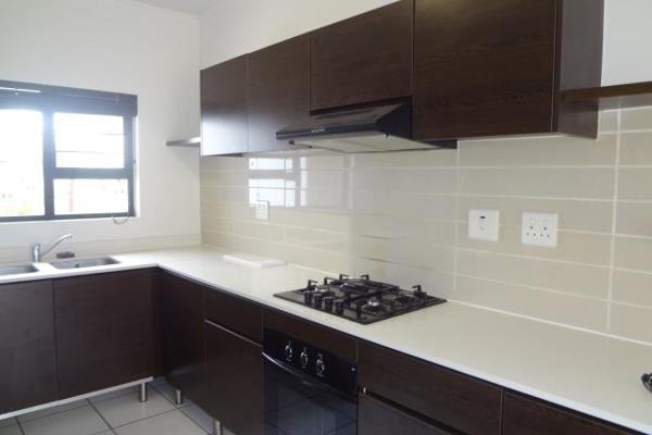 Modern Ground Floor Unit 

Features an open plan kitchen, dining room, and lounge ...