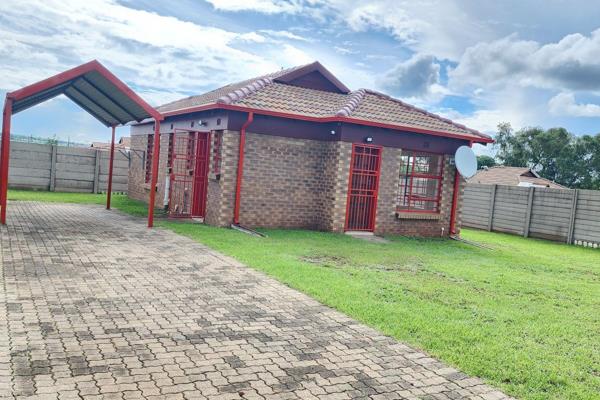 This neat like a pin home is nestled in the sought after Midrand Village Estate . A ...