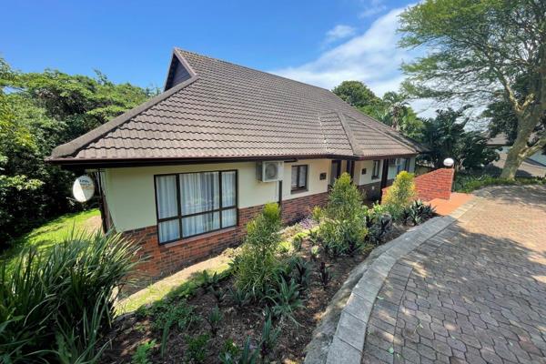 A single level, semi-detached apartment constructed of plastered and painted brickwork under concrete tiled ...