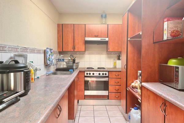 Introducing a charming 2-bedroom, 1-bathroom (shower only) upstairs unit in a secure and ...