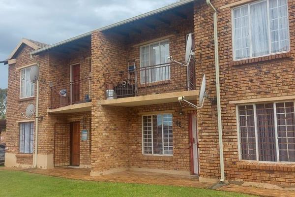 Nestled in the tranquil suburb of Chloorkop, this charming 1st-floor facebrick townhouse ...