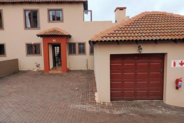 Lovely 2 bedroom  2 bathroom town house with a sunroom. Garden and built in braai ...