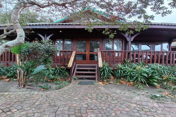 This beautiful chalet is full title, set among the trees in the Knysna River Club. What ...