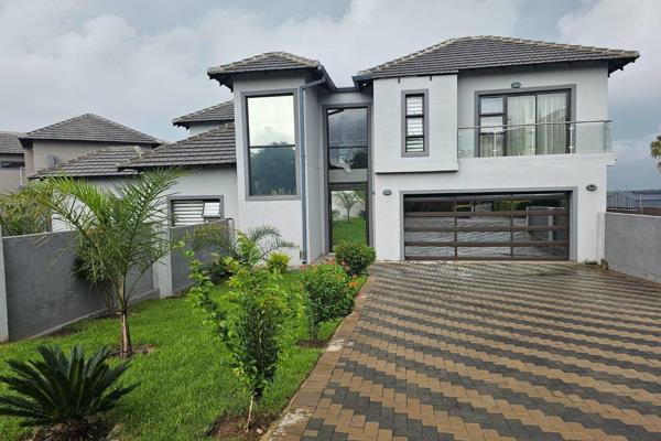 This house offers:
5 bedrooms with en suite
5 bathrooms
living area
dining area
modern open plan kitchen
scullery 
guest ...