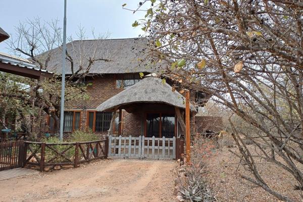 Let me introduce you to this charming 3-bedroom, 3-bathroom house nestled in the serene area of Marloth Park. This exceptional property ...