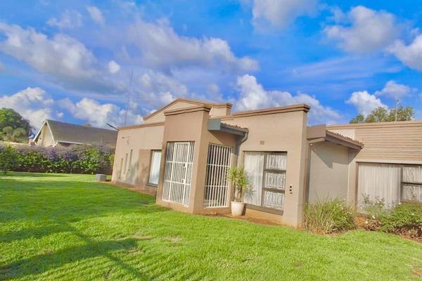 The spacious entrance hall leads to an open-plan dining area and well-appointed study.

The kitchen features granite countertops, an ...