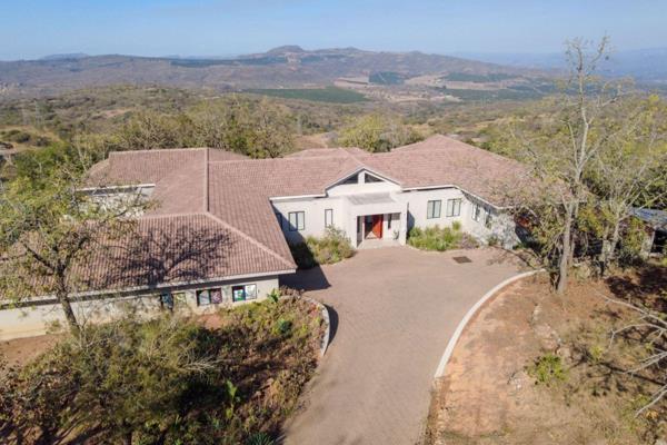 Spacious double volume home offering spectacular views over the African bush. Six bedrooms and six bathrooms, and a guest toilet. ...