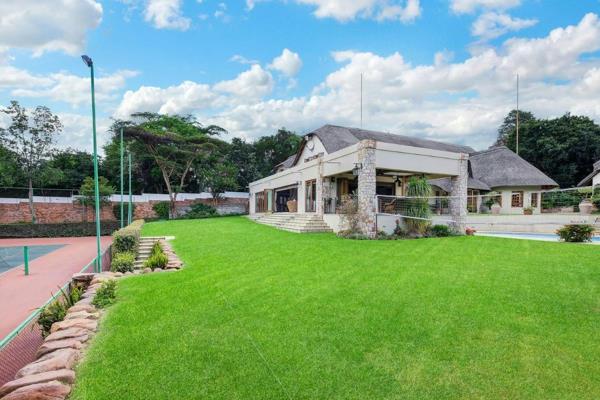 Bryanston East. Meander past soothing fountains and koi ponds to this welcoming home. ...