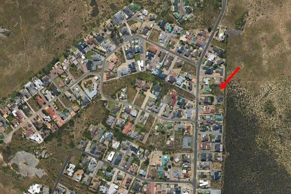 Pan-handle plot in a very popular street up in Myburgh Park, Langebaan gives you the opportunity to build a large family home on this ...