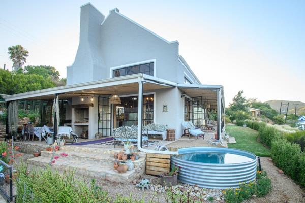 Escape to Artful Country Living in De Rust
Discover this newly built, artistically ...