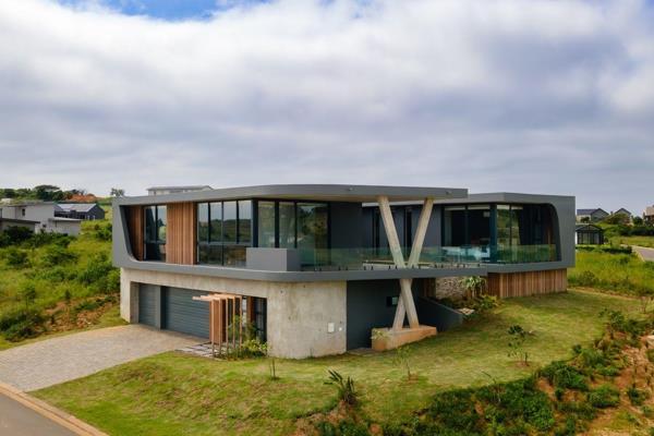 This modern, four bedroom home is located at the end of a quiet cul-de-sac with views ...