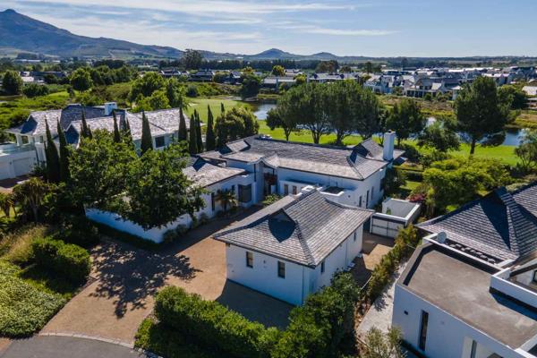 Arrive at this beautiful north-facing family-style living home on Pearl Valley Golf Estate and experience the splendour of the Cape ...