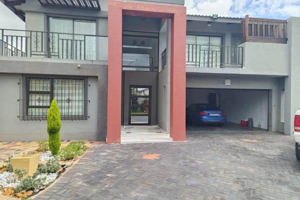 This property consists of:
5 Bedrooms
4 Bathrooms
Open plan kitchen and dining area
Scullery
Laundry
Family ...