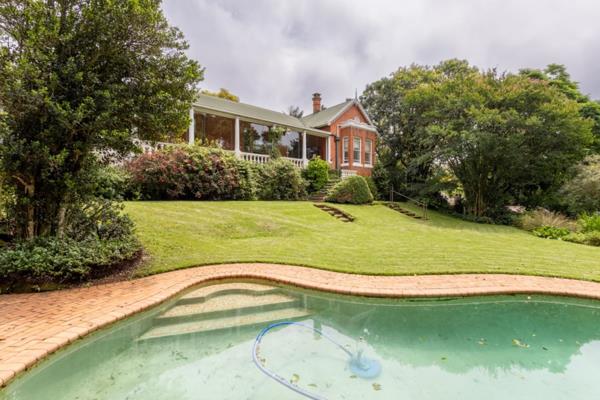 Step into this gracious historical gem, where timeless elegance meets serene living. This enchanting property is located down a country ...