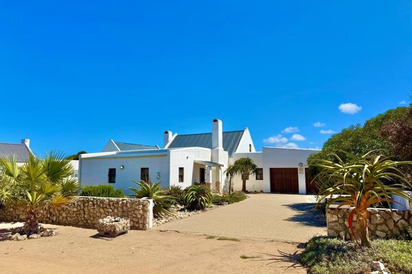 **Discover your dream home in the peaceful coastal village of Jacobsbaai.** This ...