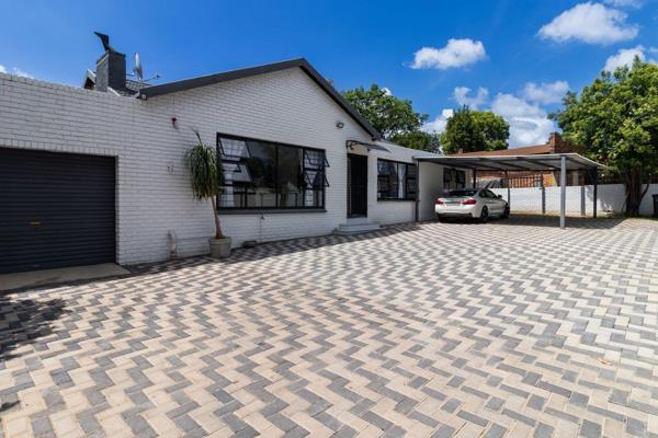 This beautifully renovated 332m2 home on a generous 1012m2 stand offers modern living ...