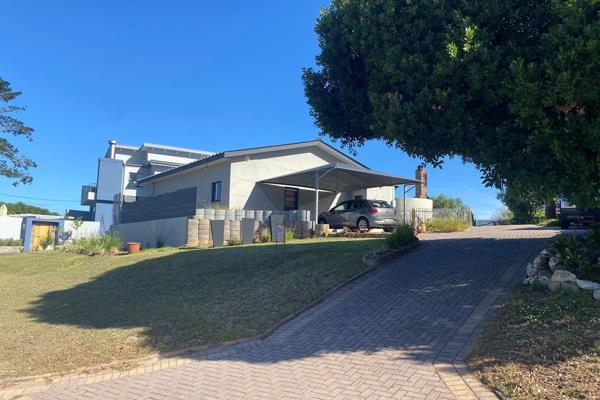 *** EXCLUSIVE SOLE MANDATE ***

Nestled within the picturesque Stilbaai Heights, this ...