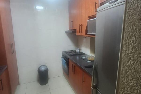 This nice ground-floor apartment comprises a large kitchen with solid wood finishes, two ...