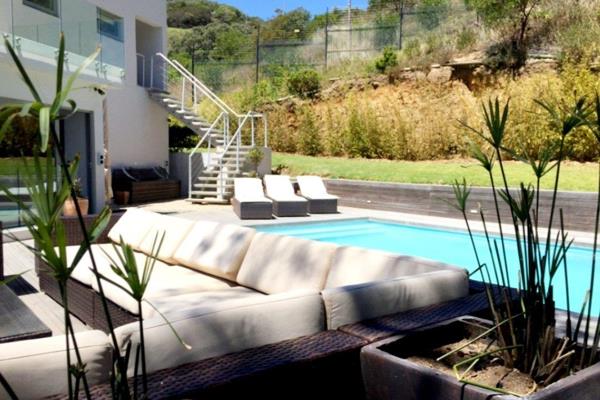 Invest Prop is proud to offer  this Spectacular Contemporary Property for your Exclusive use in the Private area of Llandudno Cape ...