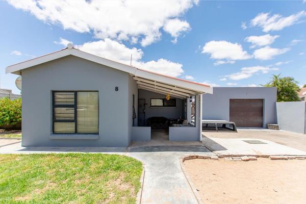 EXCLUSIVE MANDATE

Three bedroom home with two bathrooms, main with en-suite. Open plan kitchen with built in braai area. Separate TV ...