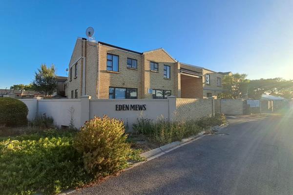 Lovely open plan lounge leading to small enclosed  paved garden with outside braai.
Kitchen with granite tops and under counter oven ...