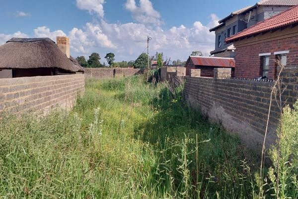 Vacant land situated on the river side of Kookrus awaiting new owner.  This pan-handle stand is surrounded by houses, fully walled with ...