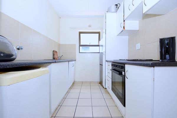 This lovely free-flowing fully tiled first floor apartment, offers 2 spacious bedrooms with built-in cupboards and one bathroom (shower ...