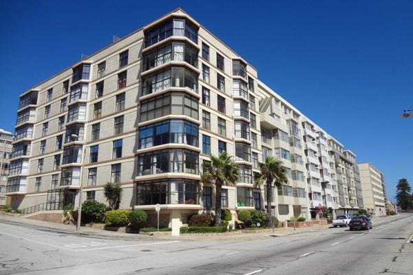 This spacious, sea-facing beachfront apartment is situated in a well managed block.

It ...