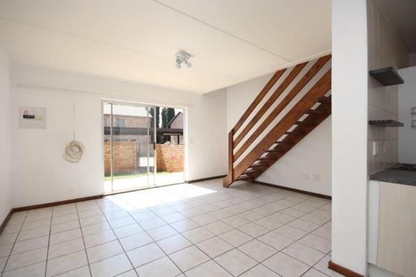 This corner unit 2 bed duplex townhouse is one of only 12 homes within the secure and quiet complex. The home offers a tiled lounge and ...