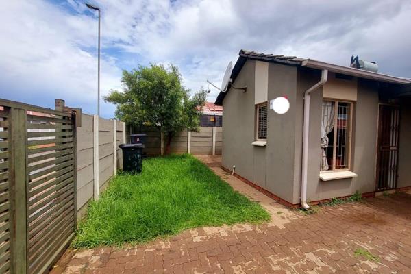 This charming 3-bedroom, 1.5-bathroom home is fully tiled throughout, offering a modern ...