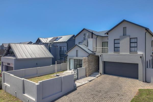 Escape to modern living in Golden Fields Estate, where this spacious 4-bedroom home ...