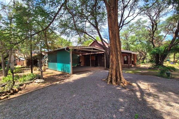 Nestled under the canopy of majestic full-grown trees, this welcoming and well-maintained 3-bedroom property offers a serene retreat ...