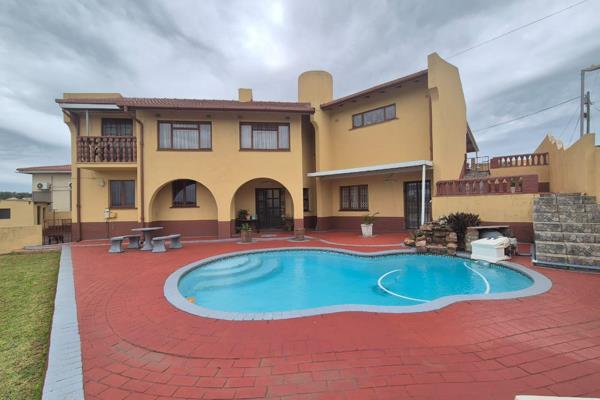 Elegant Family Home in Mobeni Heights with Pool &amp; Entertainment Area. 
This beautifully designed and impeccably maintained ...