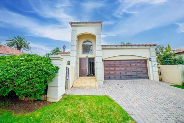 Grand Entrance hall with high ceilings which you walk into cosy formal lounge with wood fireplace that open out to patio for ...