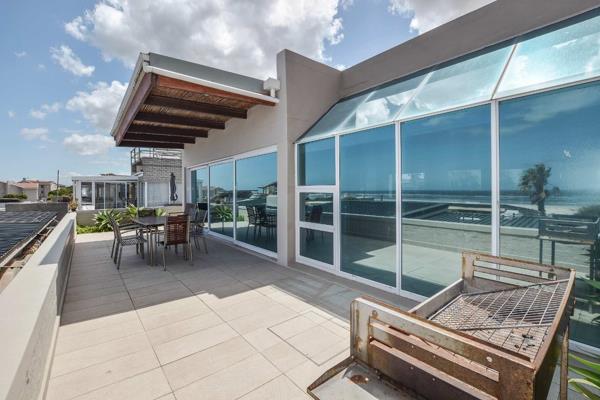 JOINT EXCLUSIVE MANDATE
Exquisite 4-bedroom haven located just metres from the pristine ...