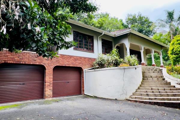 Discover the perfect blend of comfort and elegance in this stunning four-bedroom house, elevated above road level in a serene location ...