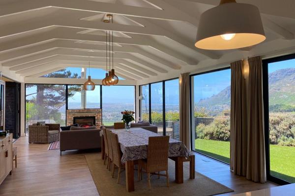 Boasting unapparelled mountain, vineyard and sea views,  this gorgeous contemporary home, with self contained cottage, offers an ...