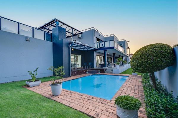 Luxurious Estate Living Awaits – Exquisite Masterpiece in Ruimsig Country Estate

5 ...