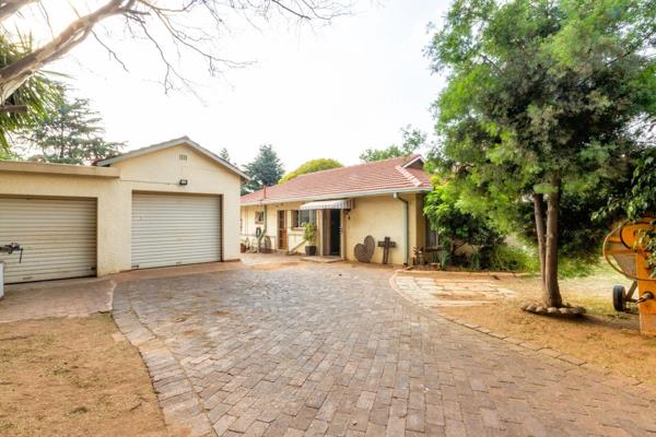 This charming home enjoys a peaceful location in a residential area just off Republic ...