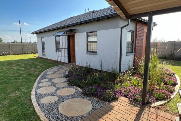 This house has an open plan kitchen with fitted cupboards, gas stove, double sink and a washing machine point. The living room is big ...