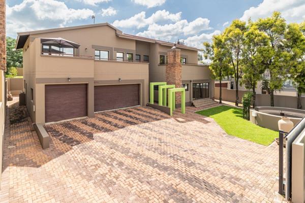 This modern and spacious home is located in a lovely estate located close to various ...