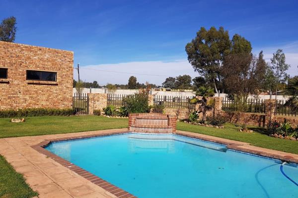 Exquisite 5-Bedroom Small Holding for Sale in Benoni AH – A Must-See Property!

Description
Discover the perfect blend of elegance ...