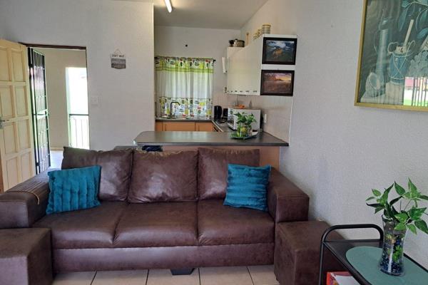 This 1-bedroom apartment, located on the ground floor of a secure complex in ...