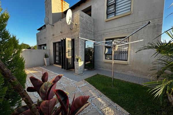 Welcome to this modern 2-bedroom townhouse offering a perfect blend of comfort, style ...