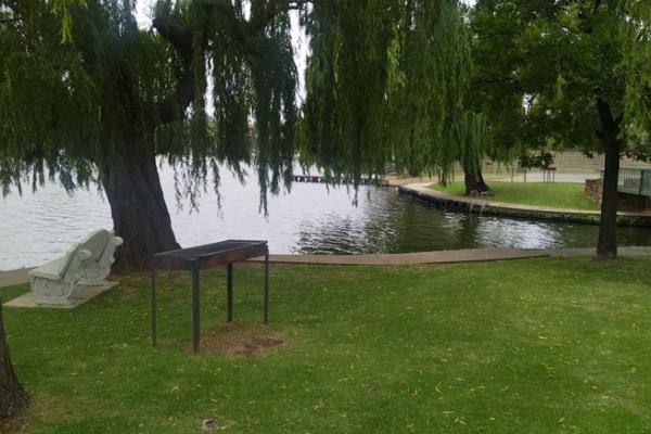 This apartment is situated in a secure estate on the Vaal River.
It consists of 2 bedrooms with built in cupboards.
The main bedroom ...